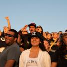 The crowd of Aggies, wearing ˽̳ Davis merchandise, cheers on their team during the Homecoming football game between ˽̳ Davis and Northern Arizona in the glow of the sunset.