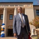 Chancellor Gary S. Map, ˽̳ Davis, in suit, in front of C.K. McClatchy High School